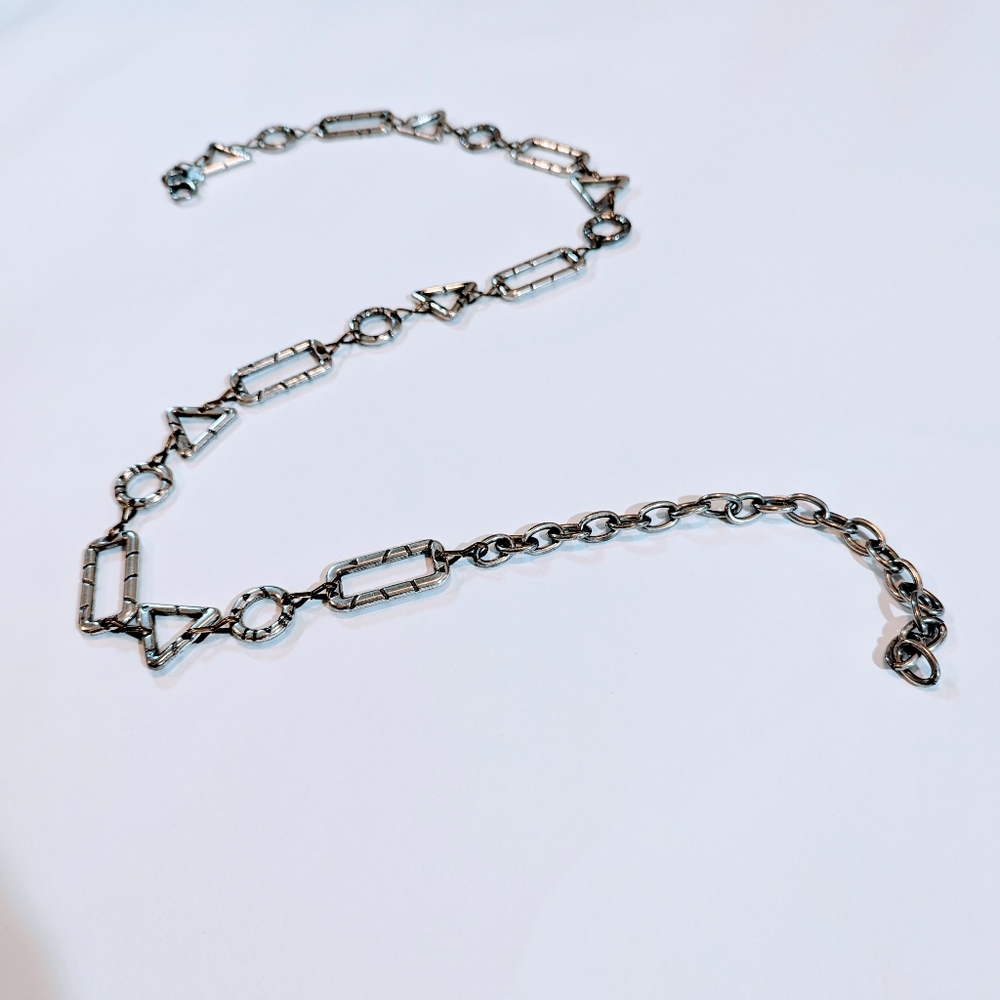 **SOLD ON DIFF PLATFORM**Vintage 80s geometric shaped silver chain belt